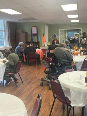 Residents enjoying activities in the dining room