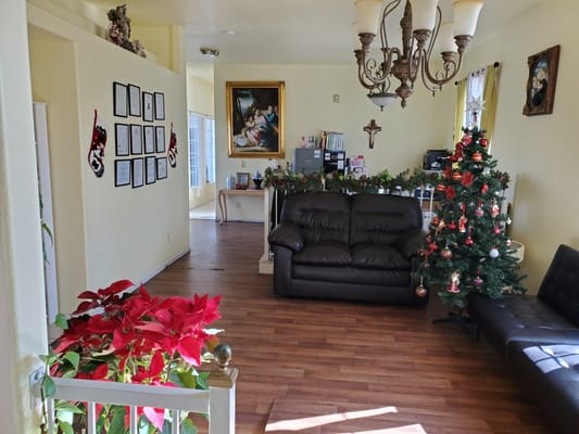 Warm common area decorated for the holidays