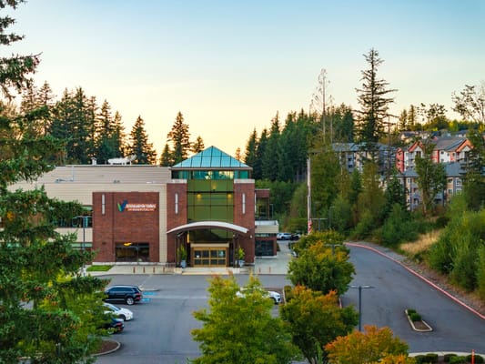 Exterior view of the facility surrounded by trees