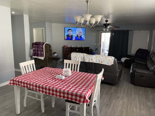 Interior common area with a dining table and seating