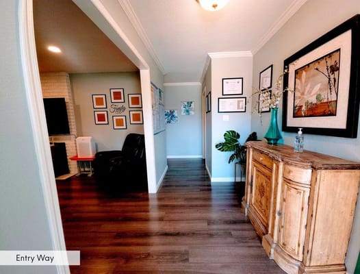 Welcoming entryway with decor and seating