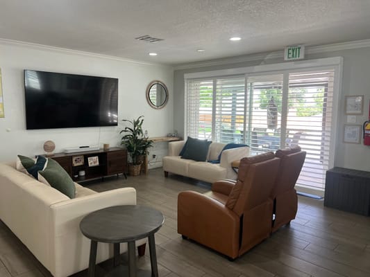 Cozy common area with comfortable seating and natural light
