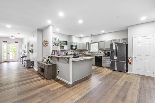 Bright interior view of a modern kitchen and dining area