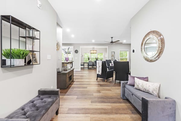 Bright interior common area with seating and decor
