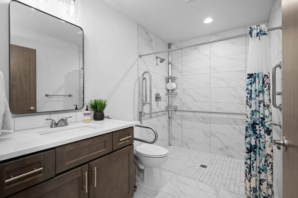 Accessible bathroom with modern fixtures and safety features