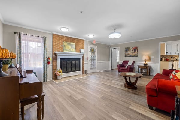 Cozy common area with seating and fireplace