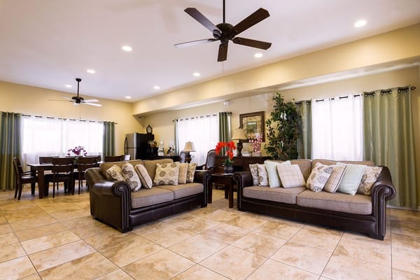 Bright common area with cozy seating and dining area