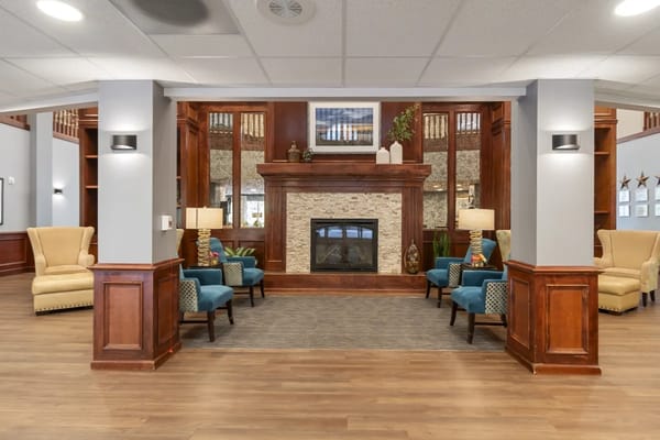 Living room with comfortable seating and a fireplace
