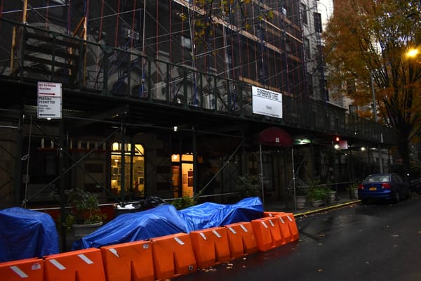 Exterior view of Pierpoint House showing scaffolding and construction barriers