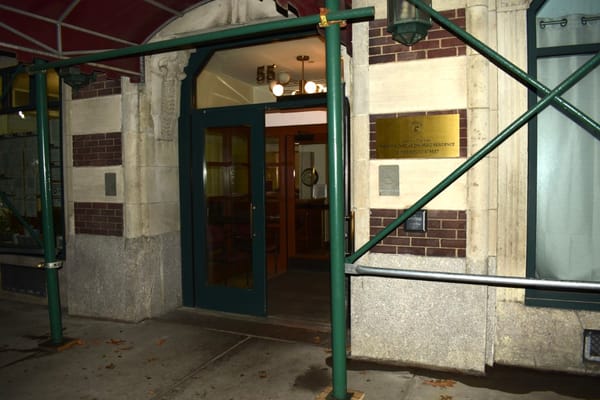 Main entrance of Pierpoint House with green scaffolding