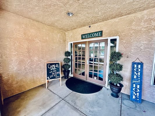 Entrance with welcome sign and decorations