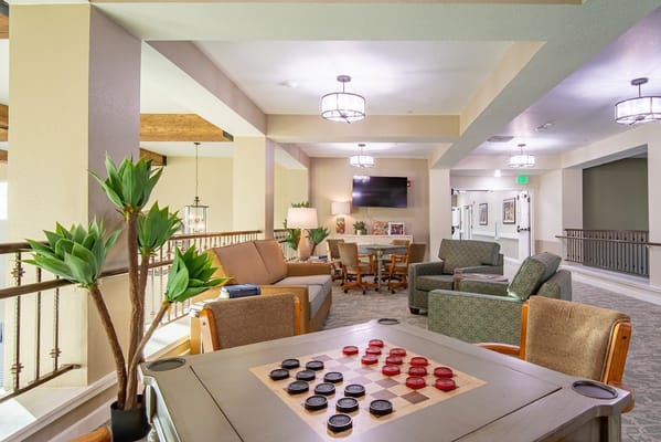 Common area with seating and checkerboard game