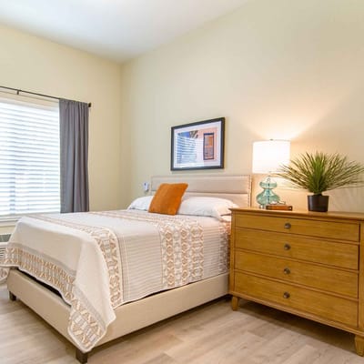 Cozy interior view of a resident bedroom