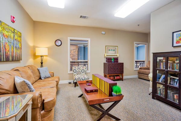 Cozy common area with seating and artwork