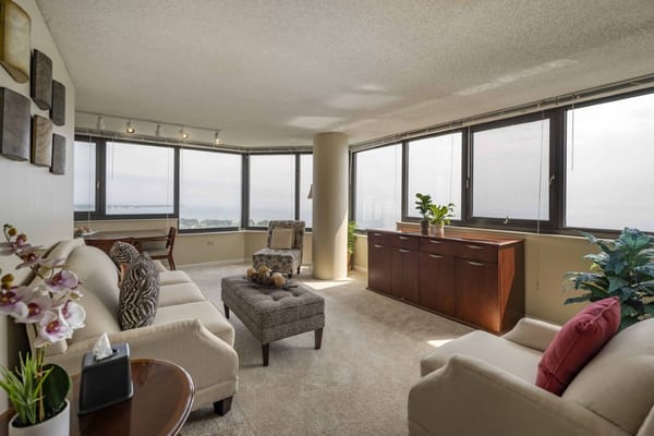 Bright and inviting lounge area with large windows