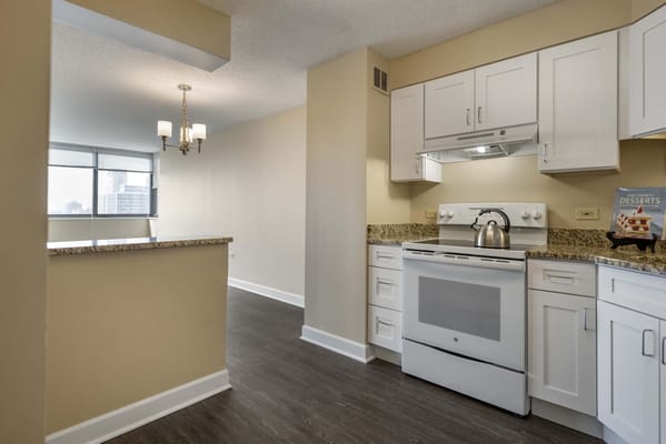 Bright and modern kitchen interior with granite countertops