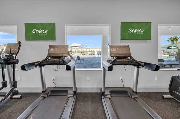 Inside view of a fitness area with treadmills