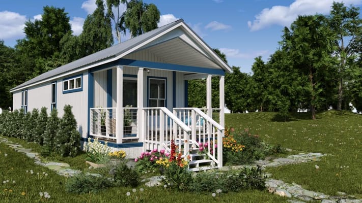 Exterior view of a small building in a garden setting