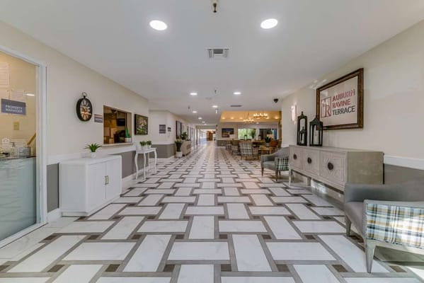 Bright interior common area with seating and decor