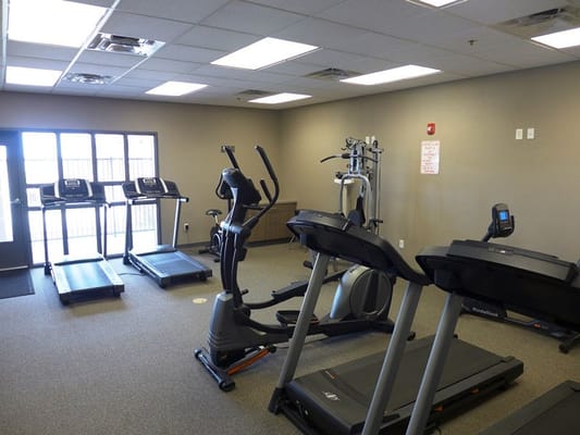 Interior view of a fitness room with exercise equipment
