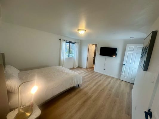 Private resident room with bed and TV