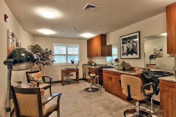 Stylish hair salon area in a senior care facility