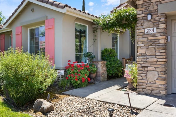 Entrance to Aunt Dottie's Place with garden and stonework