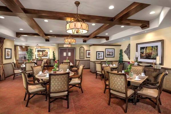 Elegant dining room with table settings and decor