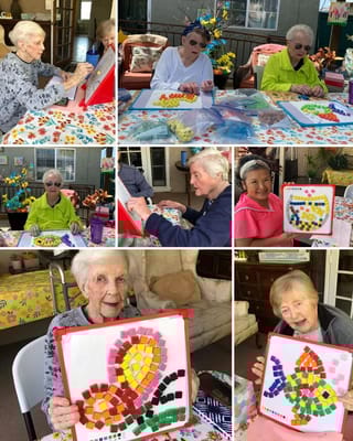 Residents engaging in a creative activity together