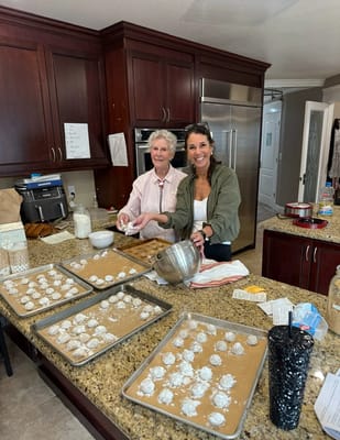 Residents baking cookies in a cozy kitchen