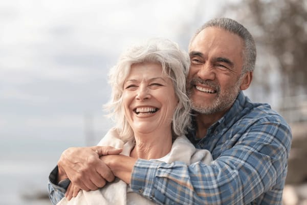 Happy elderly couple enjoying time outdoors