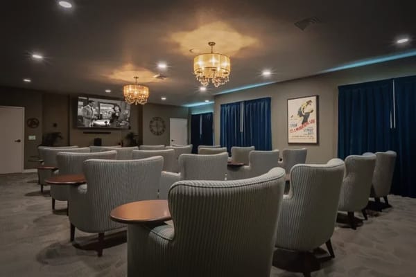 Interior view of a cozy common area with chairs