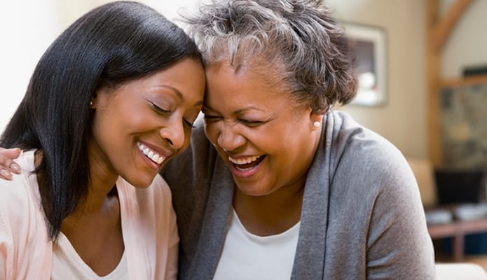 Two women sharing a joyful moment together