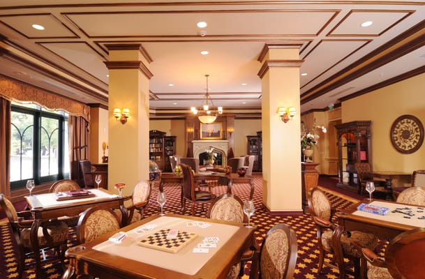 Common area with comfortable seating and game tables