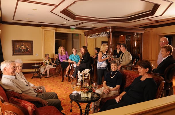 Residents socializing in a common area of the facility