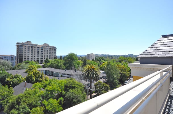 View of the surrounding landscape and buildings from a balcony