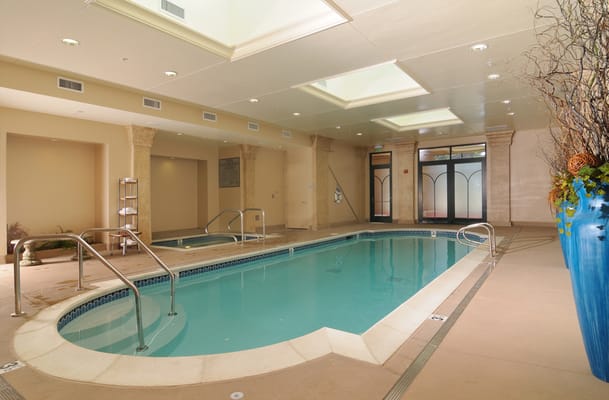 Indoor swimming pool area with elegant design