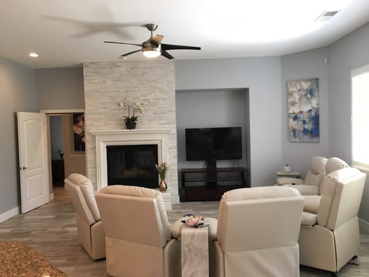 Cozy common area with seating and a fireplace