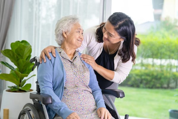 Staff member interacting with a senior resident