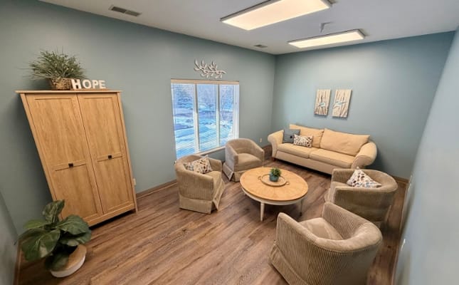 Comfortable common area with seating and natural light