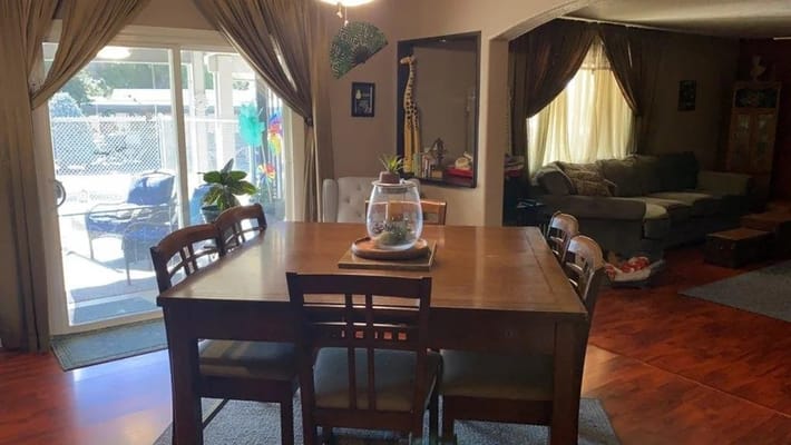 Interior view of a dining area with table and seating