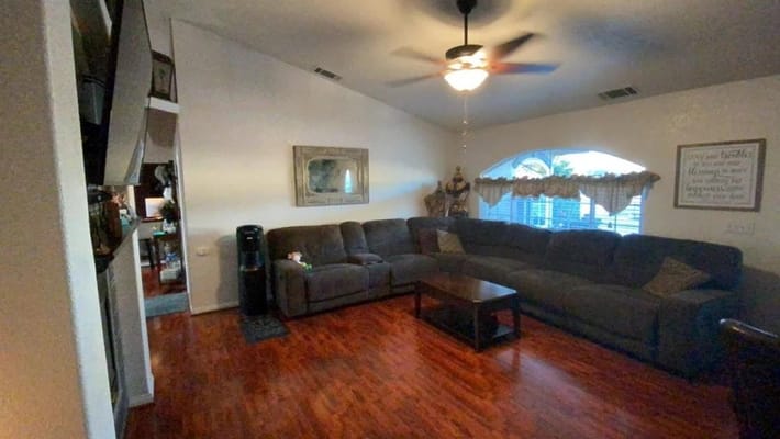 Cozy common area with comfortable seating and warm lighting