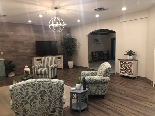 Common area with chairs and decorative lighting