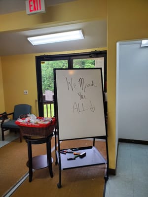 A welcome sign in a common area of the facility