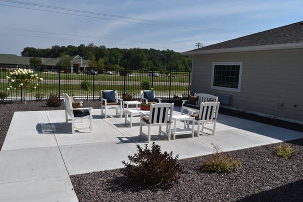 Outdoor seating area with chairs and tables