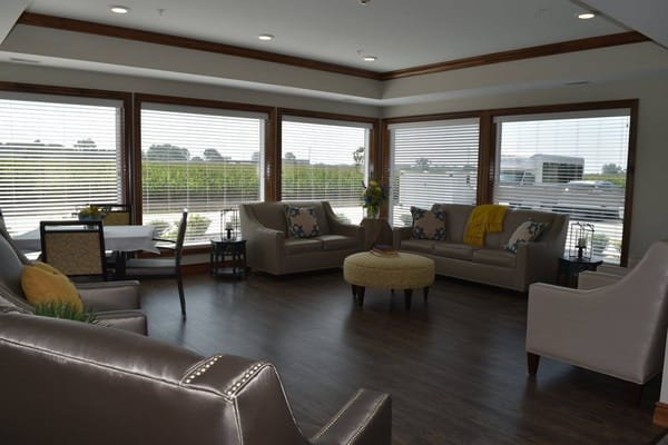Bright common area with comfortable seating and natural light