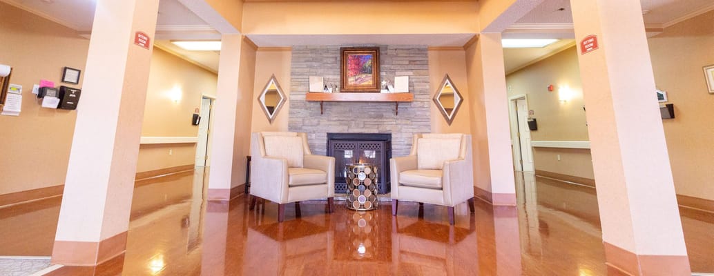 Interior common area with seating and fireplace