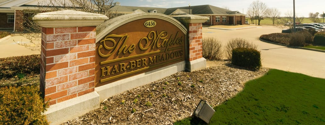 Facility sign showcasing The Maples at Har-Ber Meadows