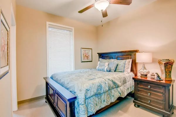 Cozy bedroom with a bed and nightstand