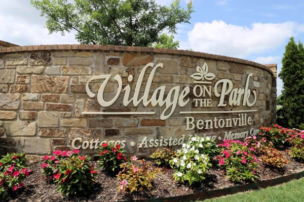 Facility logo with floral and stone design